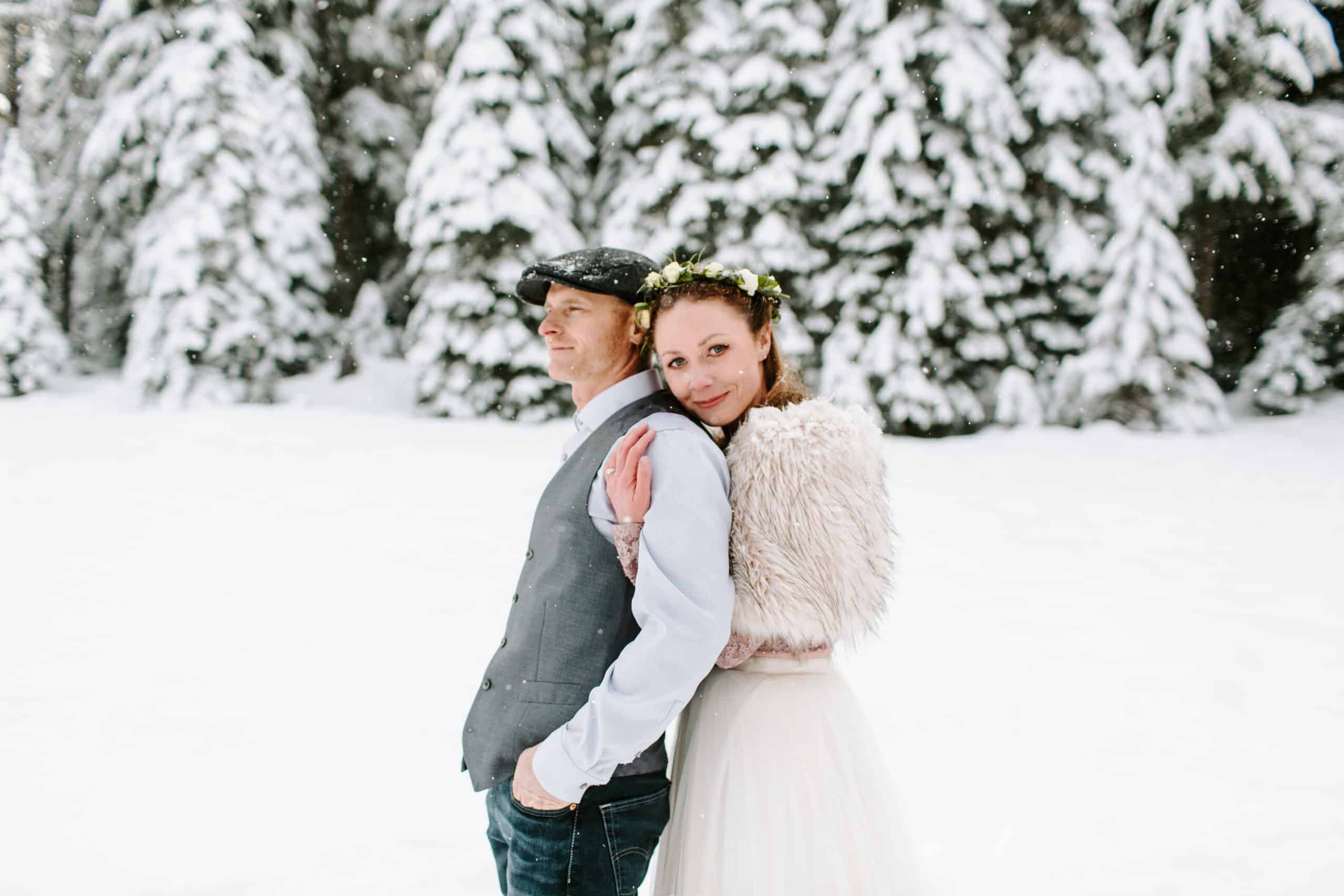 mt hood elopement bride and groom embracing in the snow